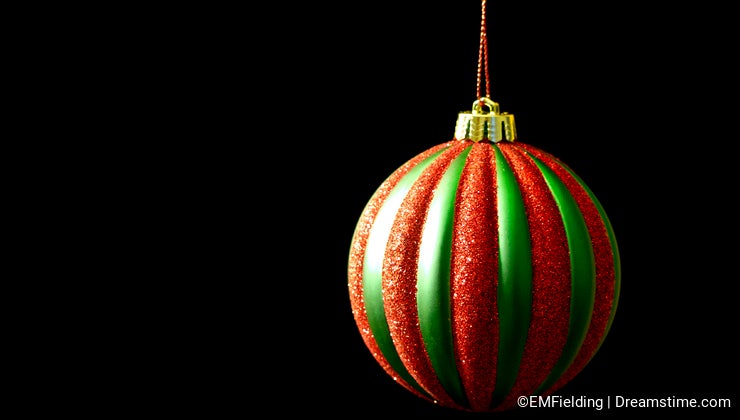 Red and Green Christmas ornament on black