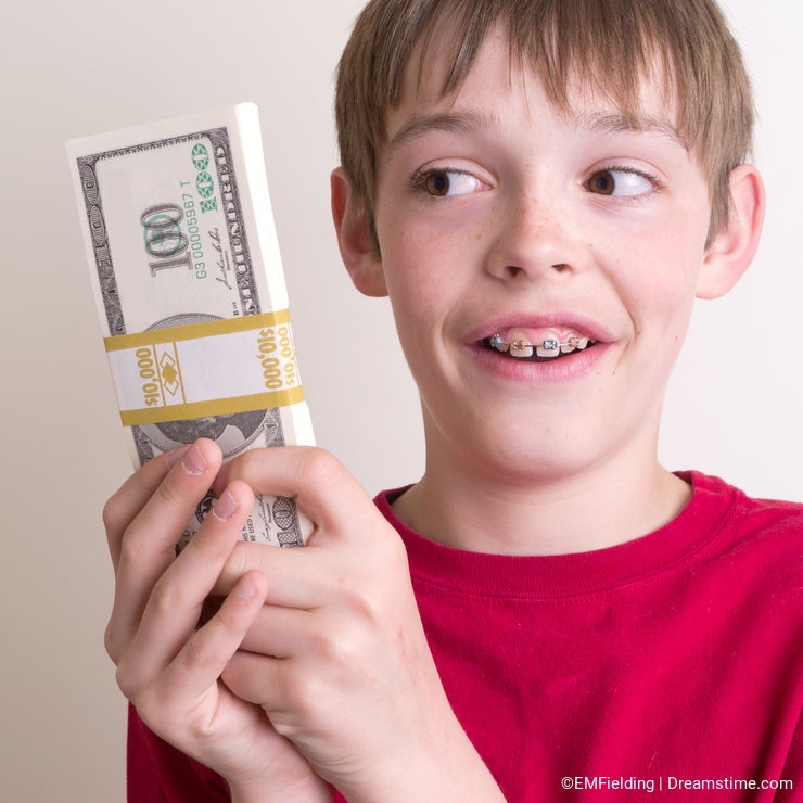 Teen holding a lot of money