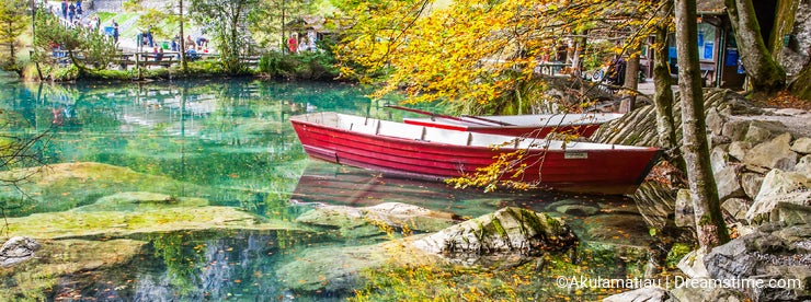 Blausee, Switzerland - Red Boats and Fall Foliage