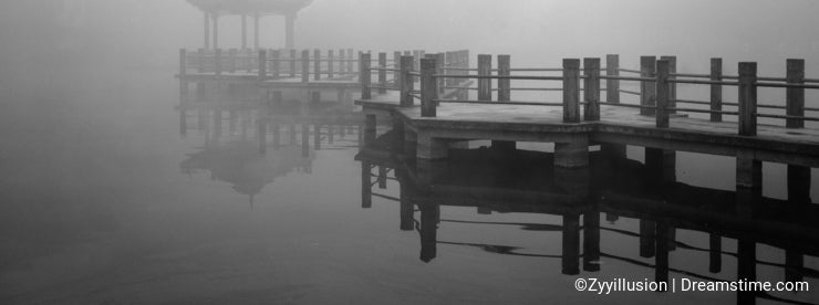 Ancient pavilion in the fog