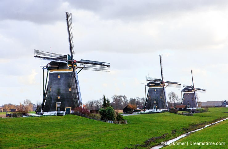 Three aligned windmills