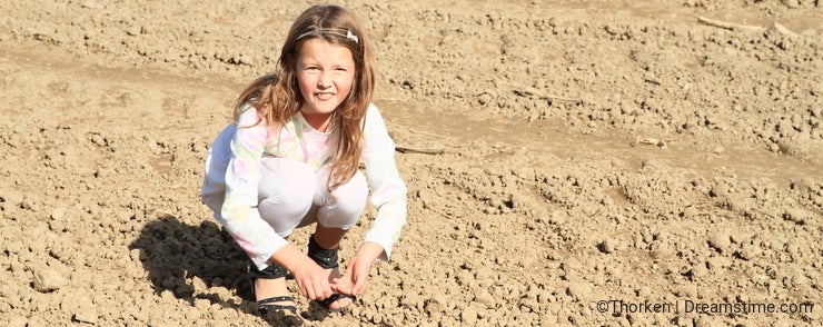 Kids - girls sowing on field