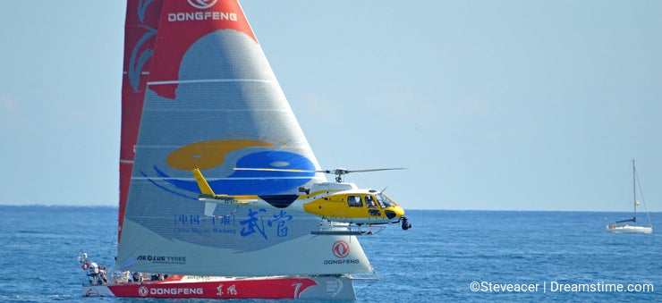 Dongfeng Race Team And A Helicopter Film Crew