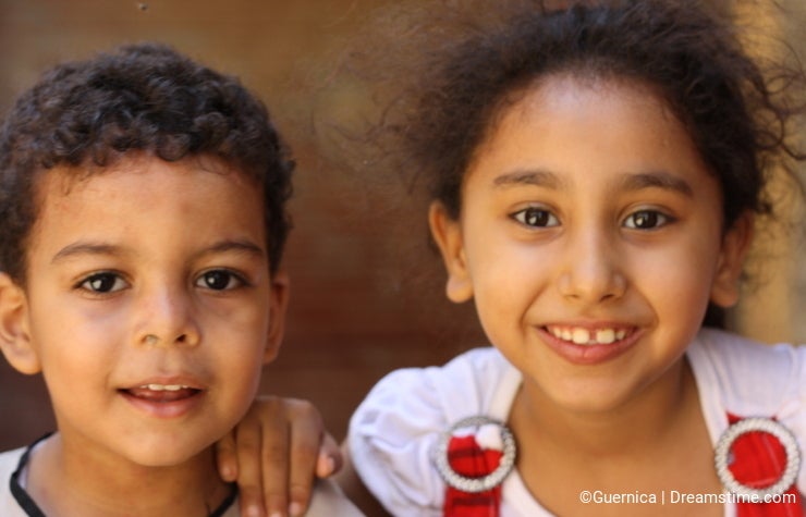 Portrait of a brother and sister children close up at charity event in giza, egypt