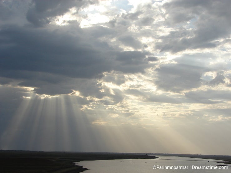 Sunrays, Clouds & River with Silver Lining