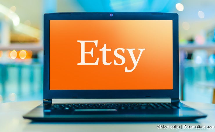 Laptop computer displaying logo of Etsy