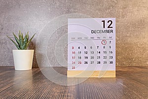 01 December text with blackboard background for calendar. And December is the twelfth and the final month of the year