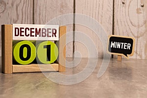 01 December text with blackboard background for calendar. And December is the twelfth and the final month of the year