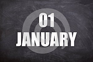 01 January text with blackboard background for calendar.