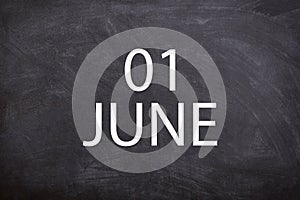 01 June text with blackboard background for calendar.