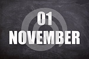 01 November text with blackboard background for calendar.