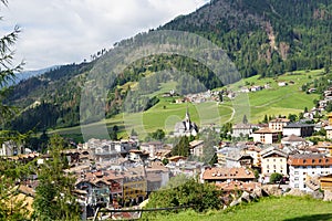 01_Wide panorama of the high mountain resort of Moena,Dolomiti