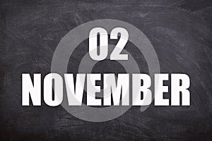 02 November text with blackboard background for calendar.