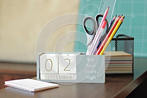 02 September. Image of september 2 wooden calendar on desktop