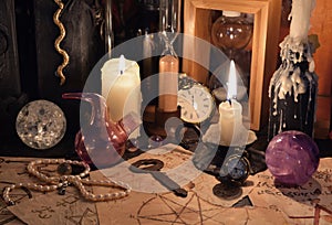 03_Close up of magic objects and candles on witch table