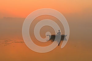 03. Lonely boat on lake  ...