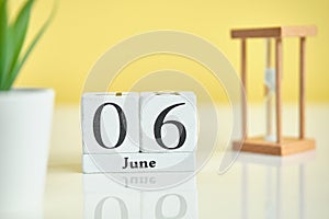 06 sixth june Month Calendar Concept on Wooden Blocks