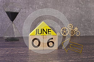 06 sixth june Month Calendar Concept on Wooden Blocks. Close up.