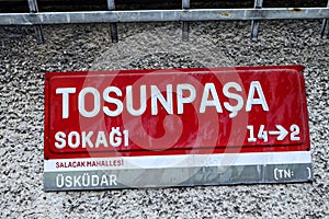 07-01-2023 Istanbul-Turkey: Red Street Sign board of Tosunpasa Street