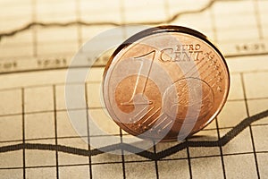 1 euro cent on newspaper