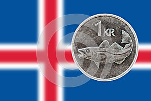 1 Icelandic krona and flag of Iceland in background - ISK