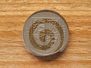 1 Pound coin, reverse side showing shield of the royal arms repr