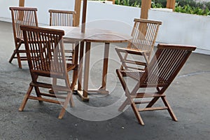 1 set of chairs and table in the courtyard