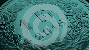 1 Swiss Franc coin close up. Dark turquoise tinted background about economy or business. Blue green banking wallpaper. Money and