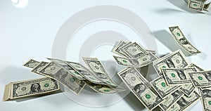 1 US Dollar banknotes flying against white background