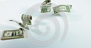 1 US Dollar banknotes flying against white background