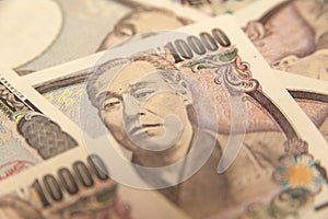 10,000 Yen Note - Close-up on face on ten thousand yen banknote front.