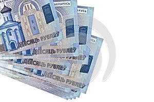 10 Belorussian rubles bills lies in small bunch or pack isolated on white. Mockup with copy space. Business and currency exchange