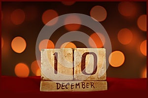 10 December vintage calendar, bokeh lights background