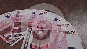 10 euro money banknotes fan on the wooden floor