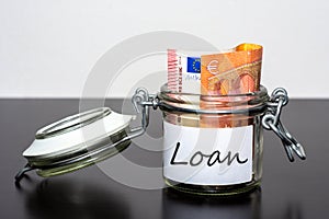 10 Euro note in the jar for Loan