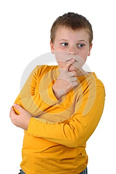 10 year old boy finger on lips isolated on white