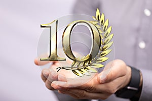 A 10 years anniversary celebration logotype with elegant celebration 3d