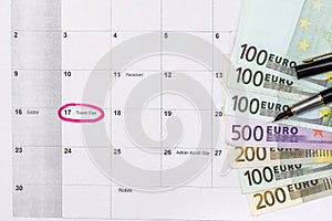 100 200 500 euro bills on calendar