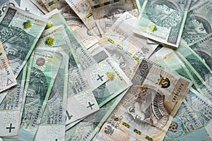 100 200 PLN zloty banknotes as financial background