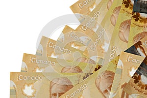 100 Canadian dollars bills lies in different order isolated on white. Local banking or money making concept