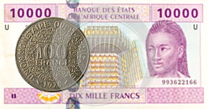 100 central african CFA franc coin against 10000 central africa