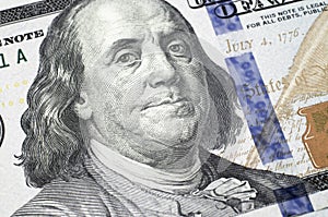 100 dollar bill close up. Part of a new hundred dollar bill. Benjamin Franklin close-up portrait