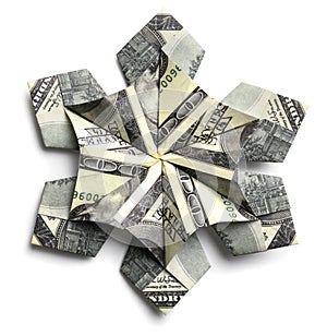 A 100 dollar bill in the shape of a snowflake on a white background