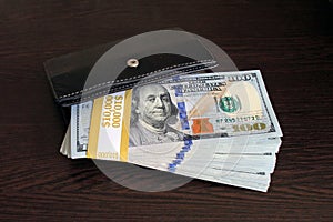 $100 dollar bills stacks - stacks of money on the table