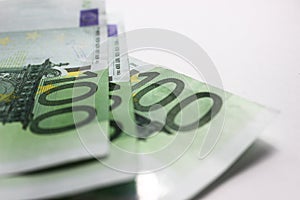 100 Euro banknotes isolated on white background.