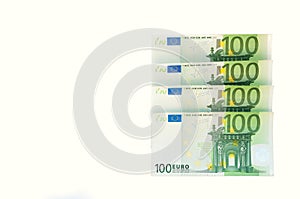 100 Euro banknotes isolated on white background