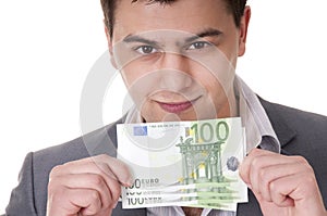 100 euro bills in male hands