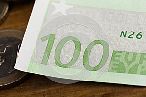 100 euro notes and coins- Image