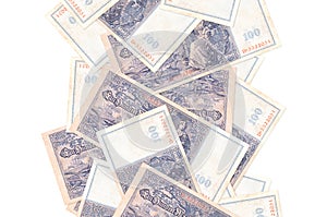 100 Reich marks bills flying down isolated on white. Many banknotes falling with white copyspace on left and right side