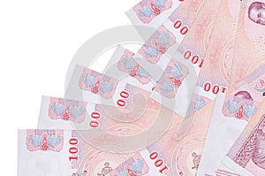 100 Thai Baht bills lies in different order isolated on white. Local banking or money making concept